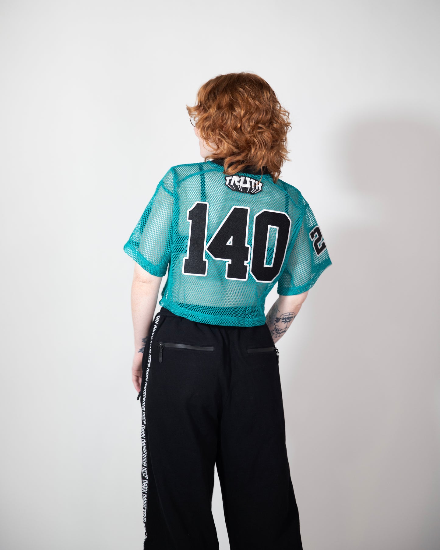TEAL MESH CROP TOP JERSEY