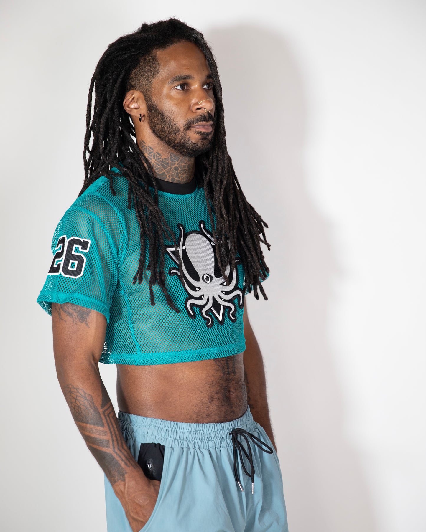 TEAL MESH CROP TOP JERSEY